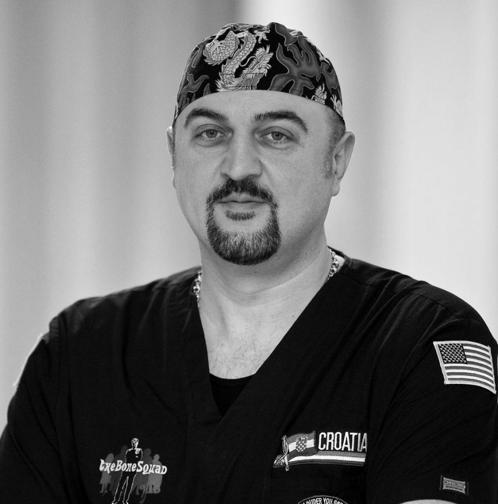 Dr. Daniel Ivankovich in scrubs